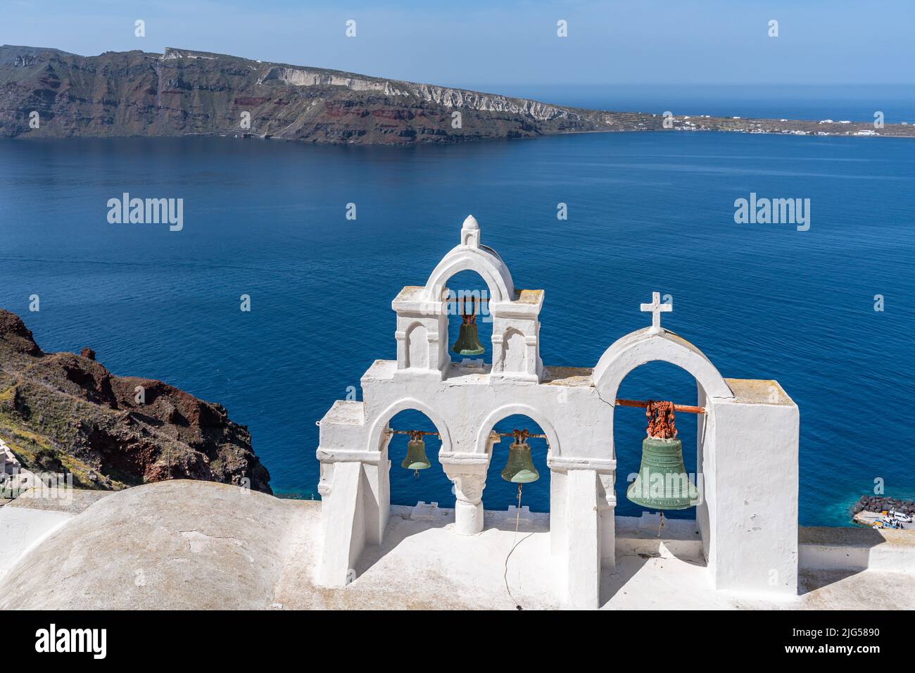 Typical church in Oia overlooking the Mediterranean Sea, Santorini, Greece Stock Photo