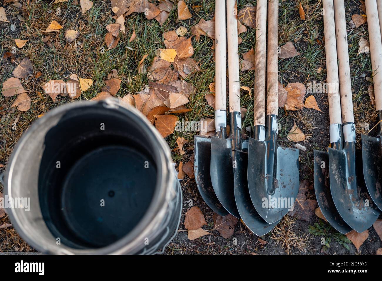 top view of shovel and plastic bucket on grass or planting with gardening tools Stock Photo Alamy