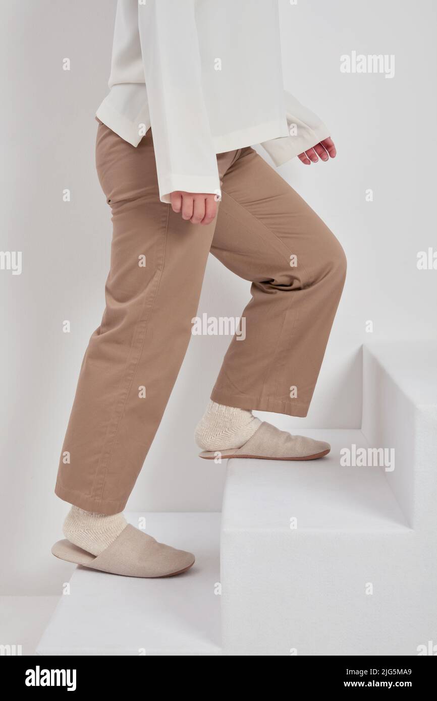 Japanese woman climbing stairs Stock Photo Alamy