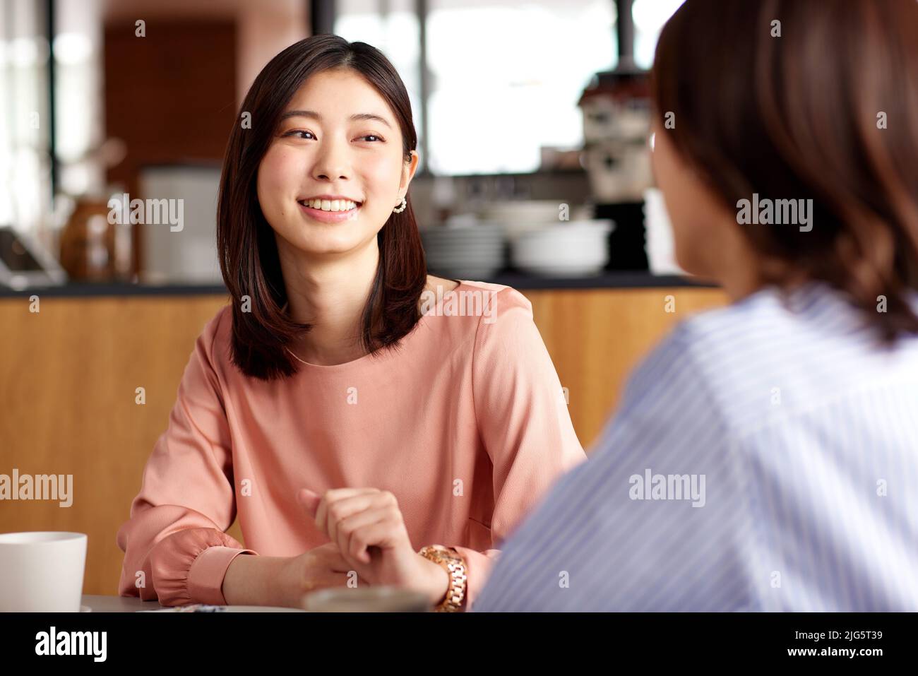 Japanese women at a cafe Stock Photo - Alamy