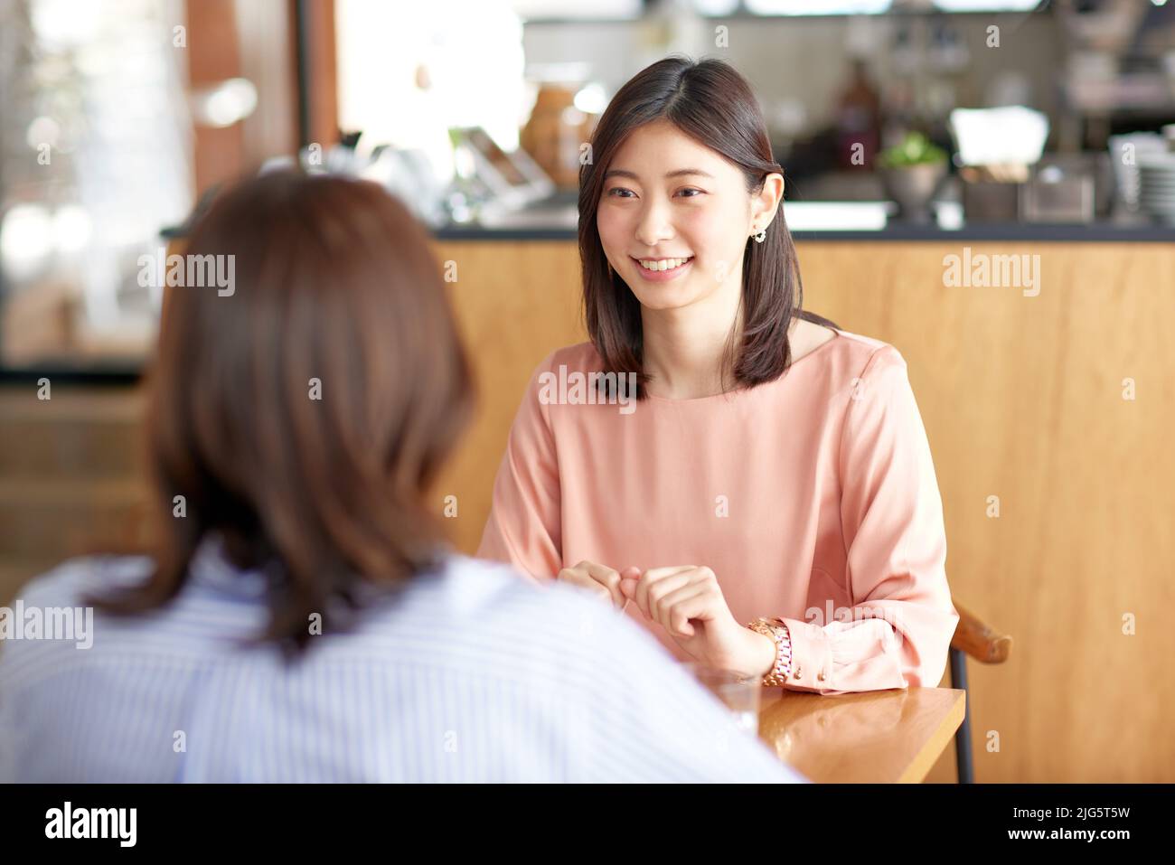 Japanese women at a cafe Stock Photo - Alamy