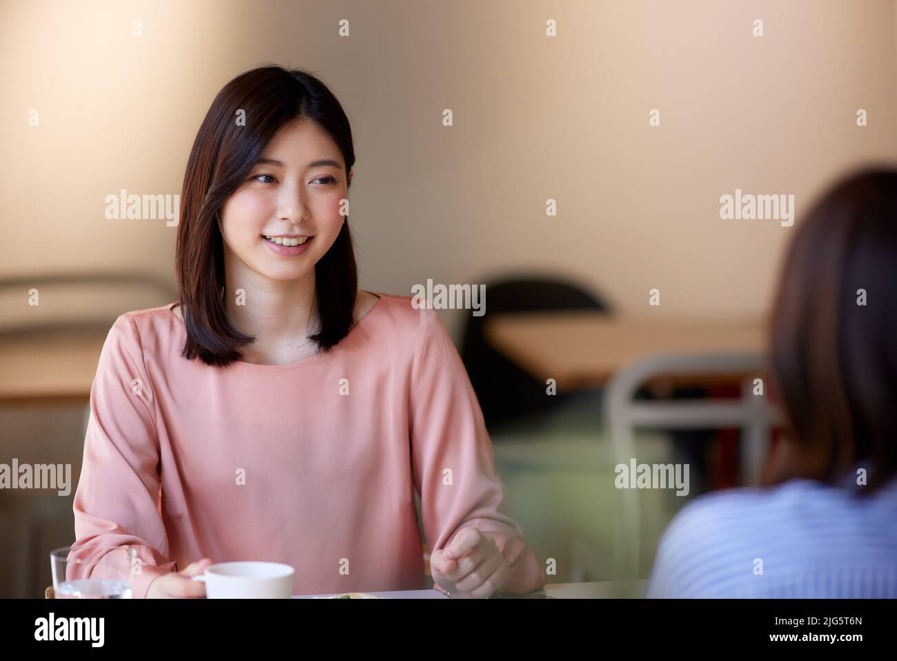 Japanese women at a cafe Stock Photo - Alamy