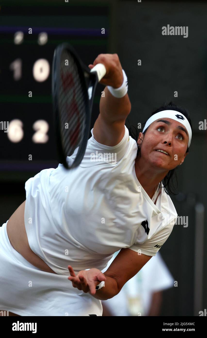 5 July 2022, All England Lawn Tennis Club, Wimbledon, London, United Kingdom:  Tunisia's Ons Jabeur serves to Marie Bouzkova of the Czech Republic during their quarterfinal match at Wimbledon today.  Jabeur won the match to advance to the semi finals. Stock Photo