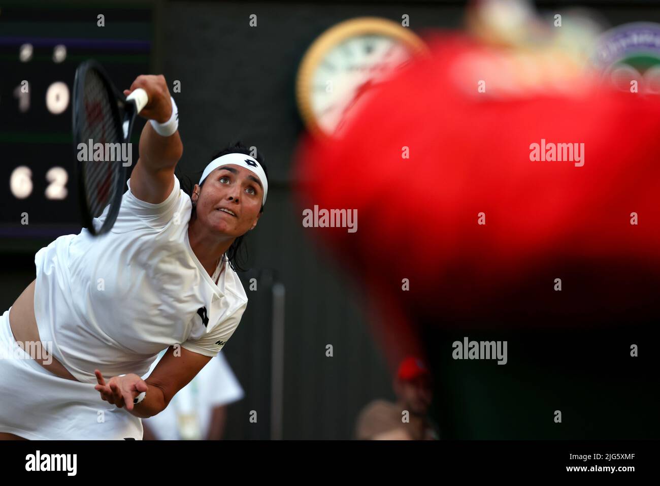 5 July 2022, All England Lawn Tennis Club, Wimbledon, London, United Kingdom:  Tunisia's Ons Jabeur serves to Marie Bouzkova of the Czech Republic during their quarterfinal match at Wimbledon today.  Jabeur won the match to advance to the semi finals. Stock Photo