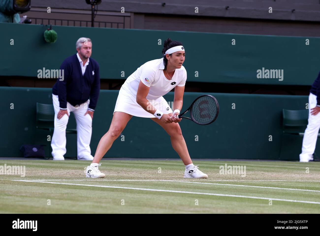 5 July 2022, All England Lawn Tennis Club, Wimbledon, London, United Kingdom:  Tunisia's Ons Jabeur awaits serve from Marie Bouzkova of the Czech Republic during their quarterfinal match at Wimbledon today.  Jabeur won the match to advance to the semi finals. Stock Photo