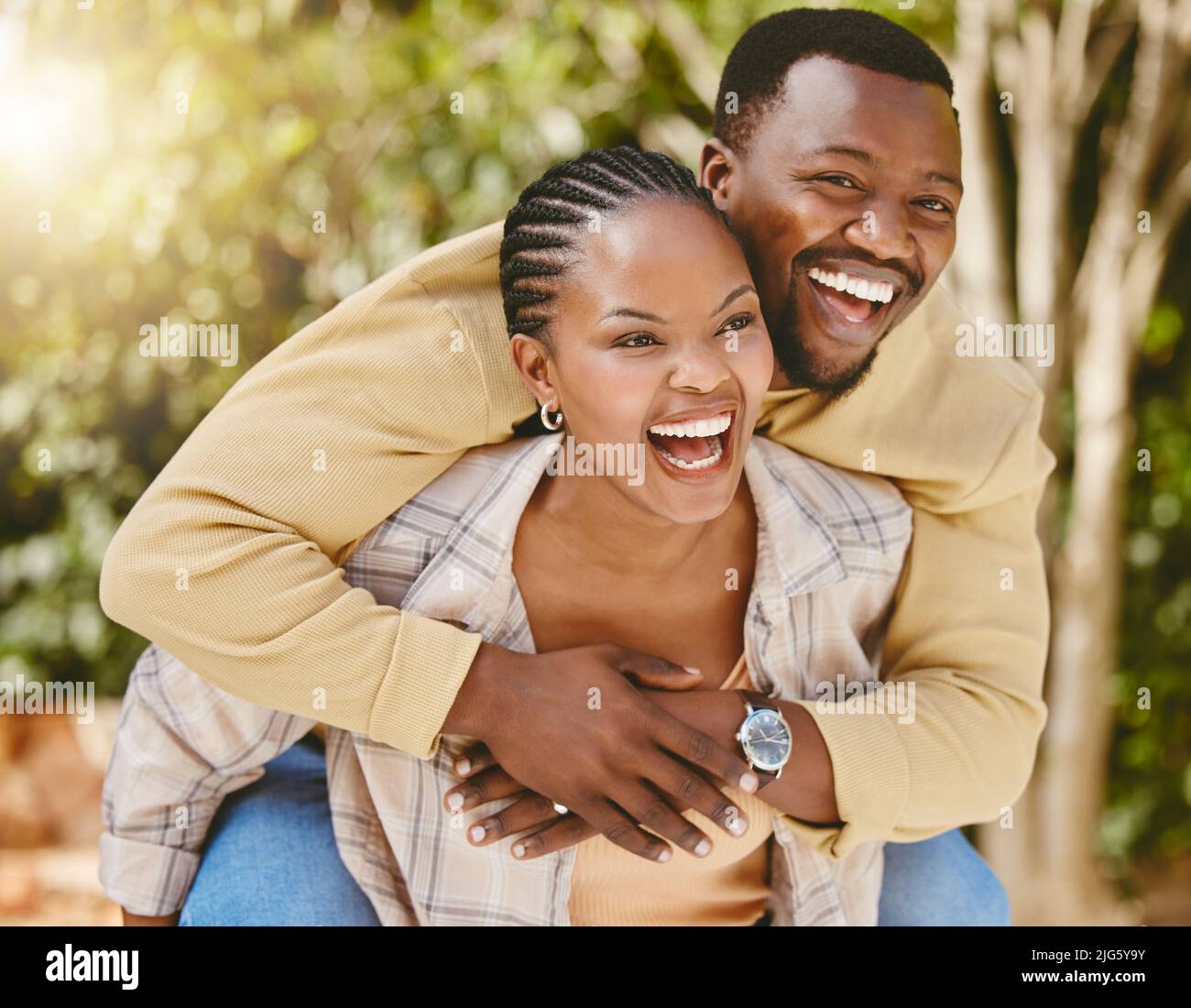 I meant it when I said I have your back. Shot of an affectionate couple spending time outdoors. Stock Photo