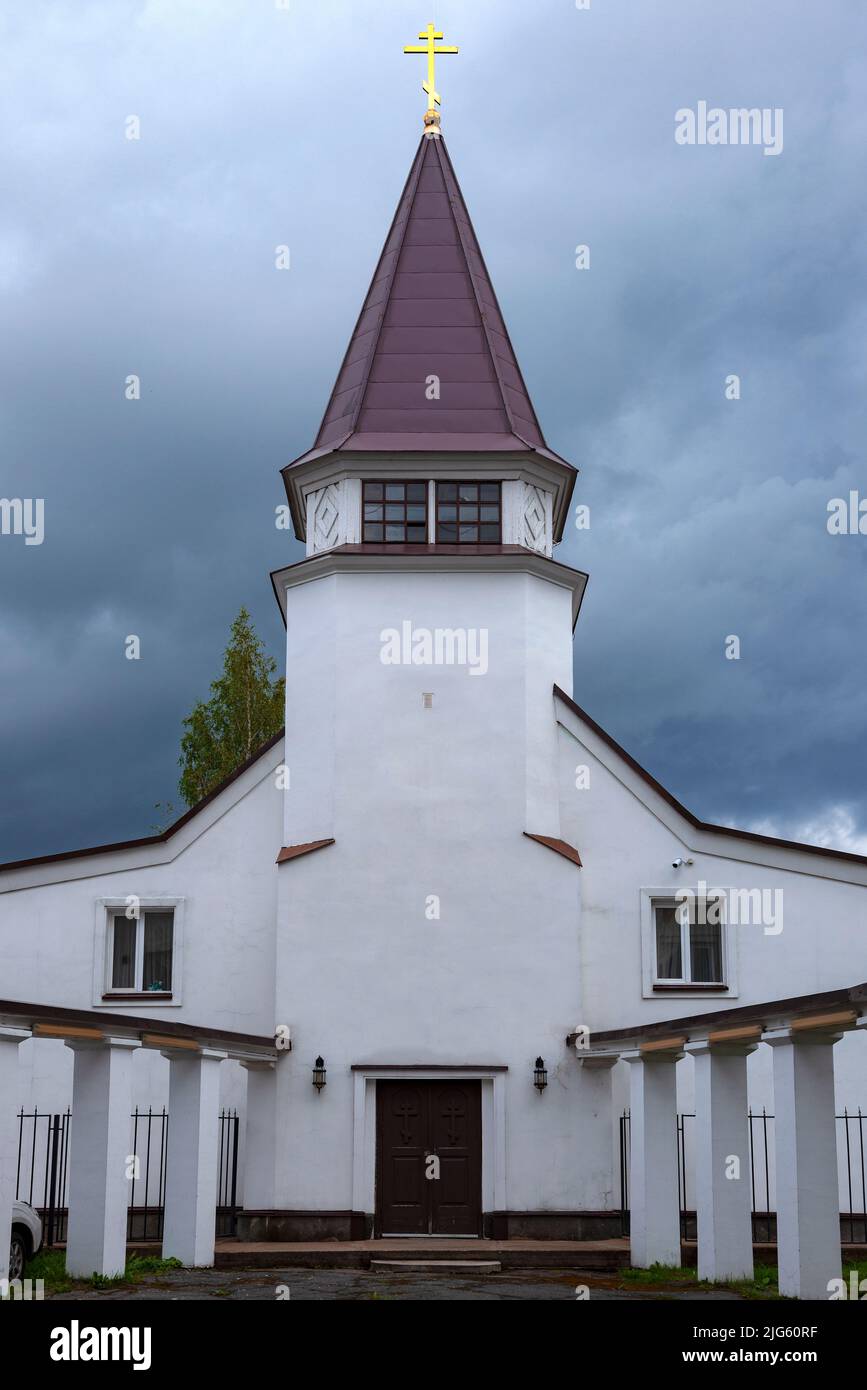 Church of St. John the Theologian (1931) under a stormy sky on a August day. Sortavala, Karelia. Russian Federation Stock Photo