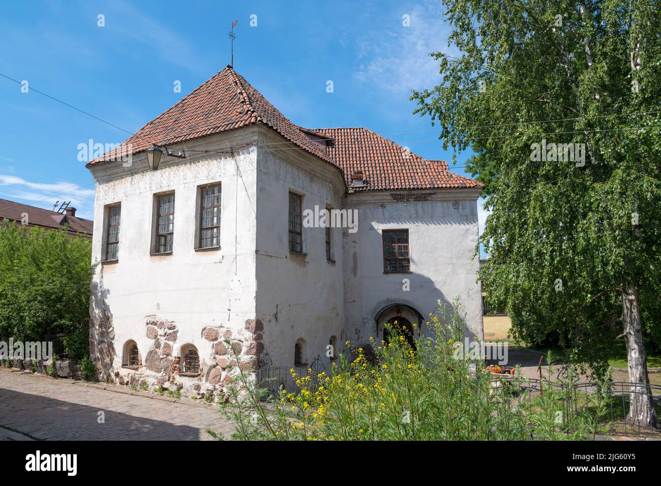 Knight's house (House of Janisch, church of St. Hyacinth) - one of the oldest medieval buildings in Vyborg on a sunny July day. Leningrad region, Russ Stock Photo