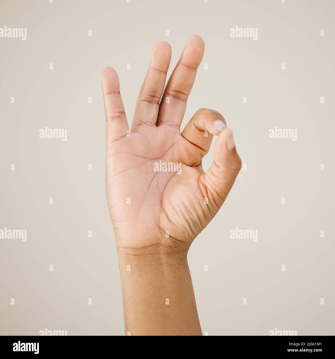 Youre doing just fine. Cropped shot of a man showing a hand sign ...