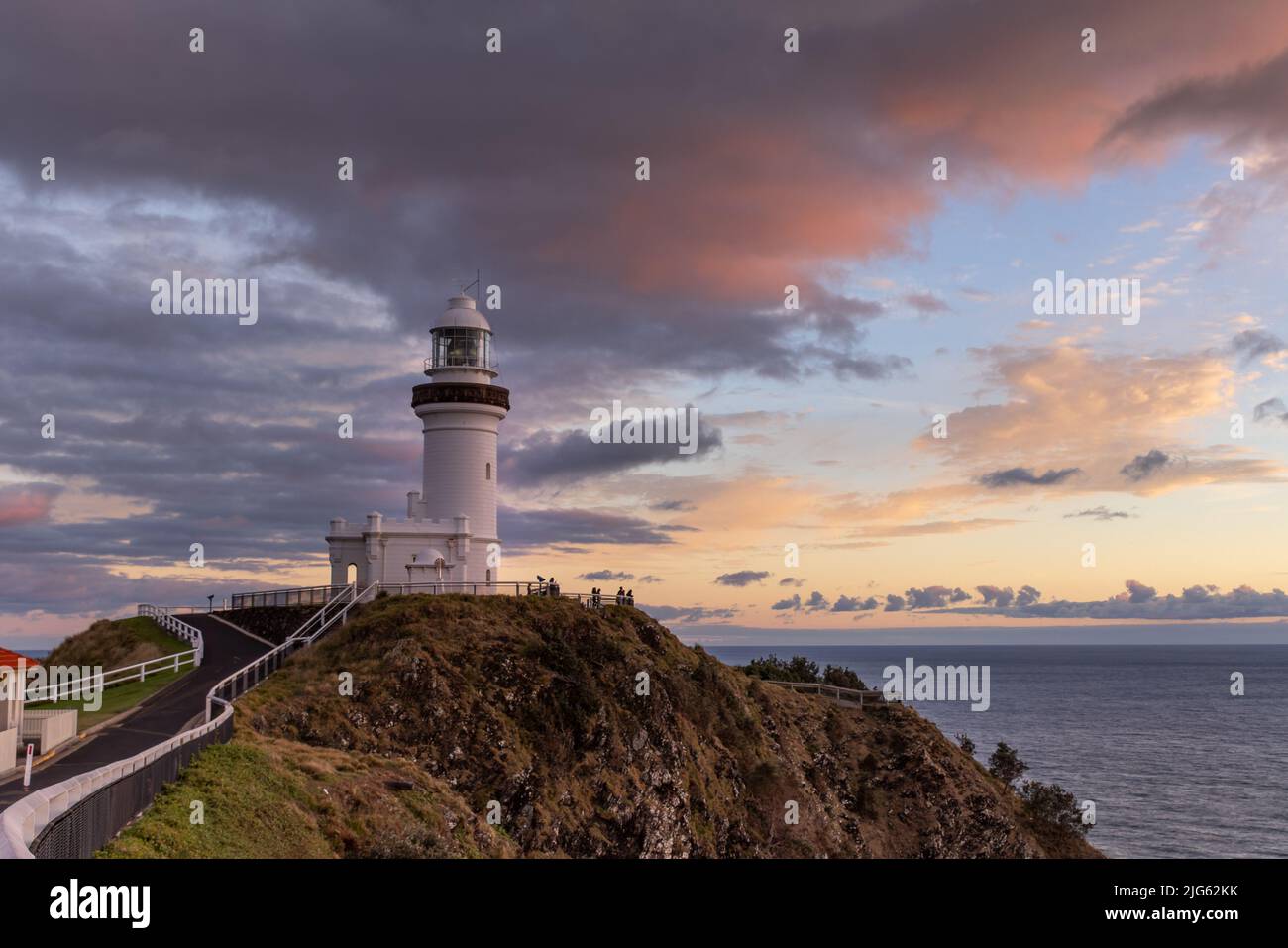 a wide shot at sunrise of the historic lighthouse at cape byron at byron bay Stock Photo
