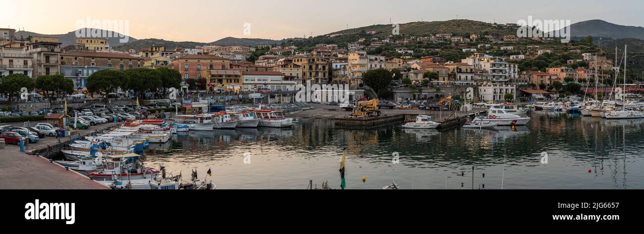 View of Marina di Camerota port and waterfront at sunset, Campania, Italy Stock Photo