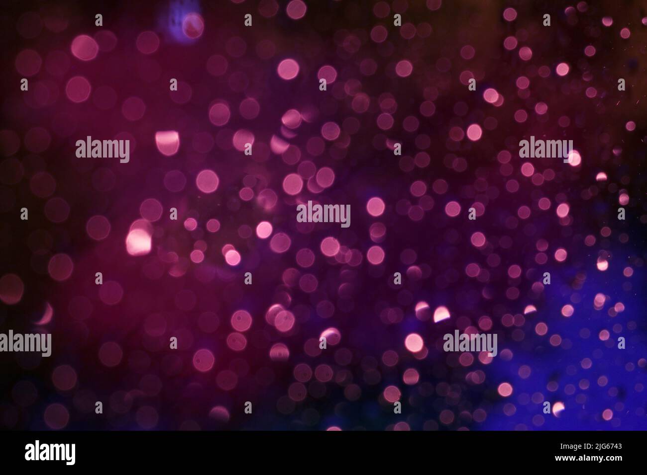 Mysterious abstract bokeh, navy blue background. Stock Photo