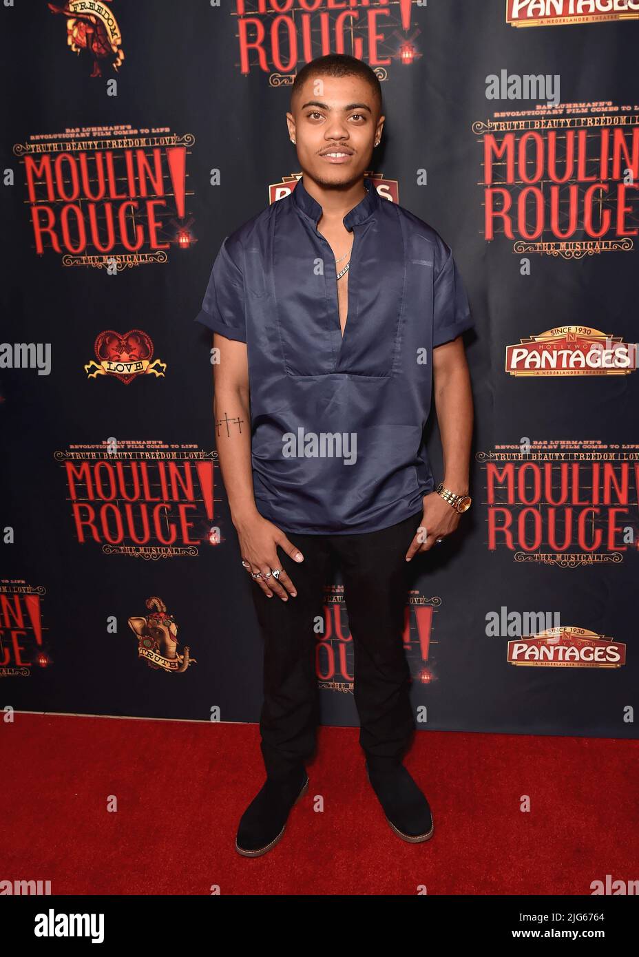 Los Angeles, CA, July 7, 2022. Reed Shannon walking on the red carpet opening night of "Moulin