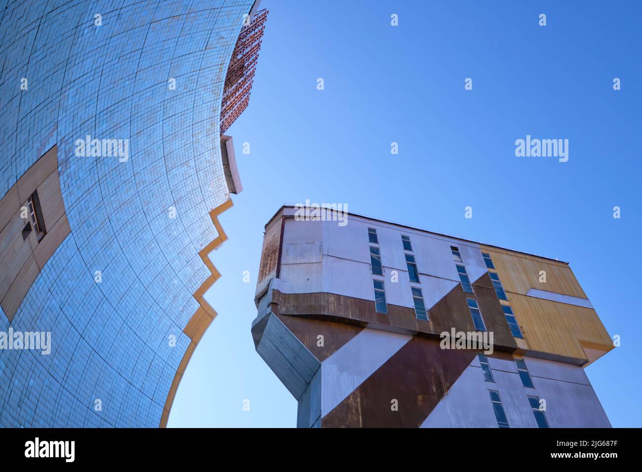 The curved concentrator mirror of the giant reflector  at the Physics of the Sun Institute of Physics and Technology. In Parkent, near Tashkent, Uzbek Stock Photo