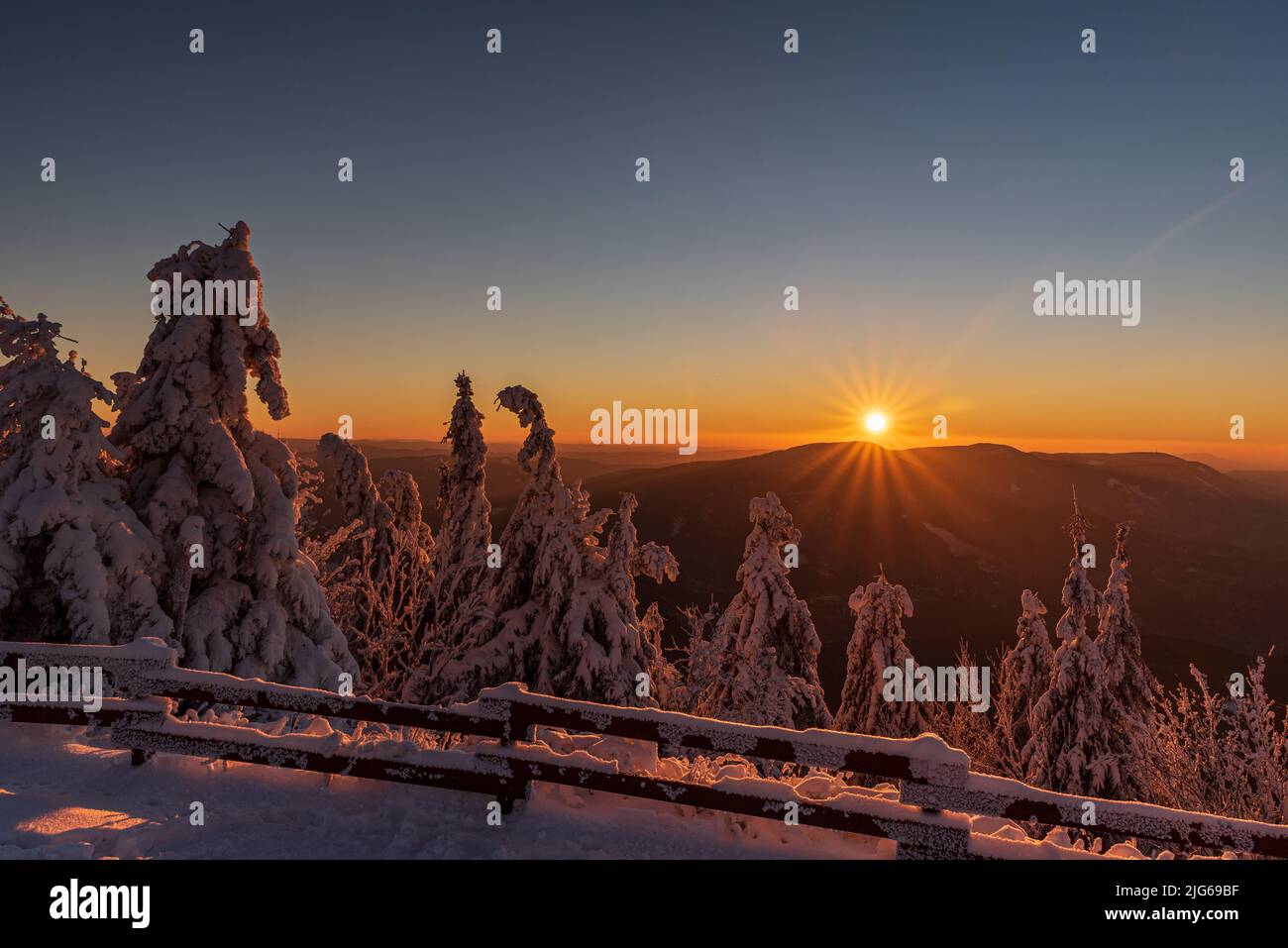 Sunset from Lysa hora hill summit in winter Moravskoslezske Beskydy mountains in Czech republic Stock Photo