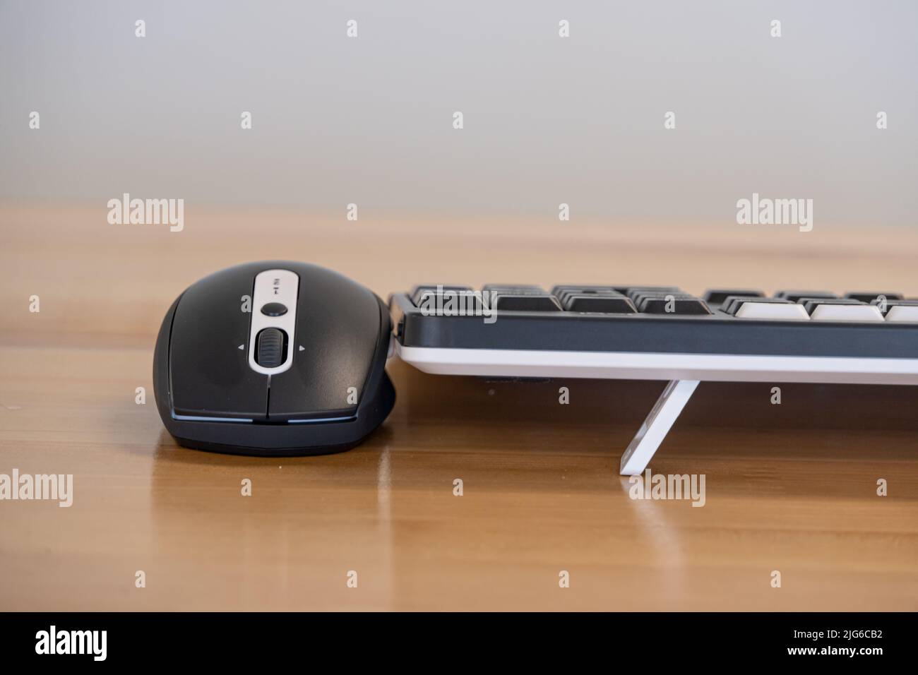 Computer keyboard and mouse on the desk close up. Stock Photo