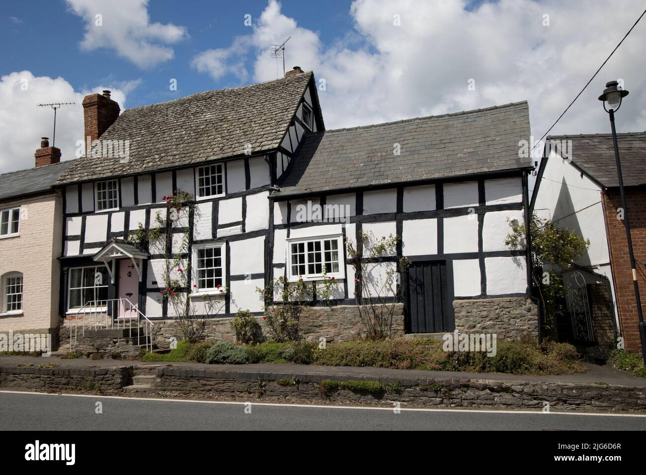 Medieval black and white half timbered houses in the mediaeval village of Pembridge in Arrow Valley Herefordhire UK Stock Photo
