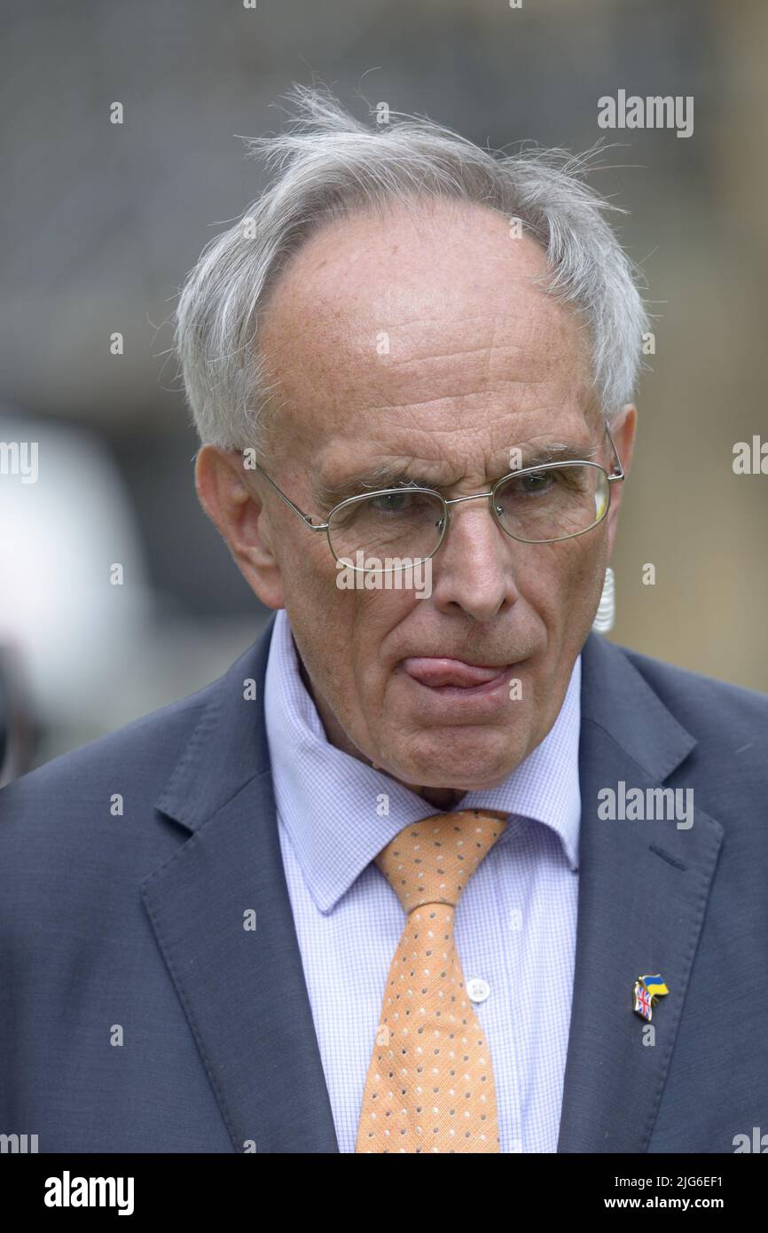 Peter Bone MP (Con: Wellingborough) on College Green, Westminster, on the day before the resignation of Prime Minister Boris Johnson - 6th July 2022 Stock Photo