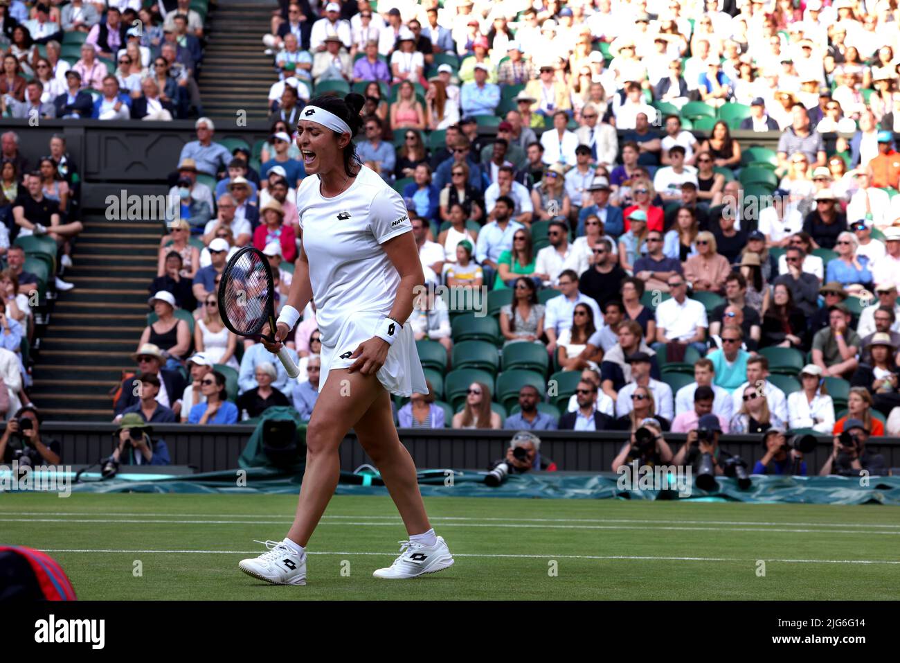 5 July 2022, All England Lawn Tennis Club, Wimbledon, London, United Kingdom:  Tunisia's Ons Jabeur celebrates a point against Marie Bouzkova of the Czech Republic during their quarterfinal match at Wimbledon today.  Jabeur won the match to advance to the semi finals. Stock Photo