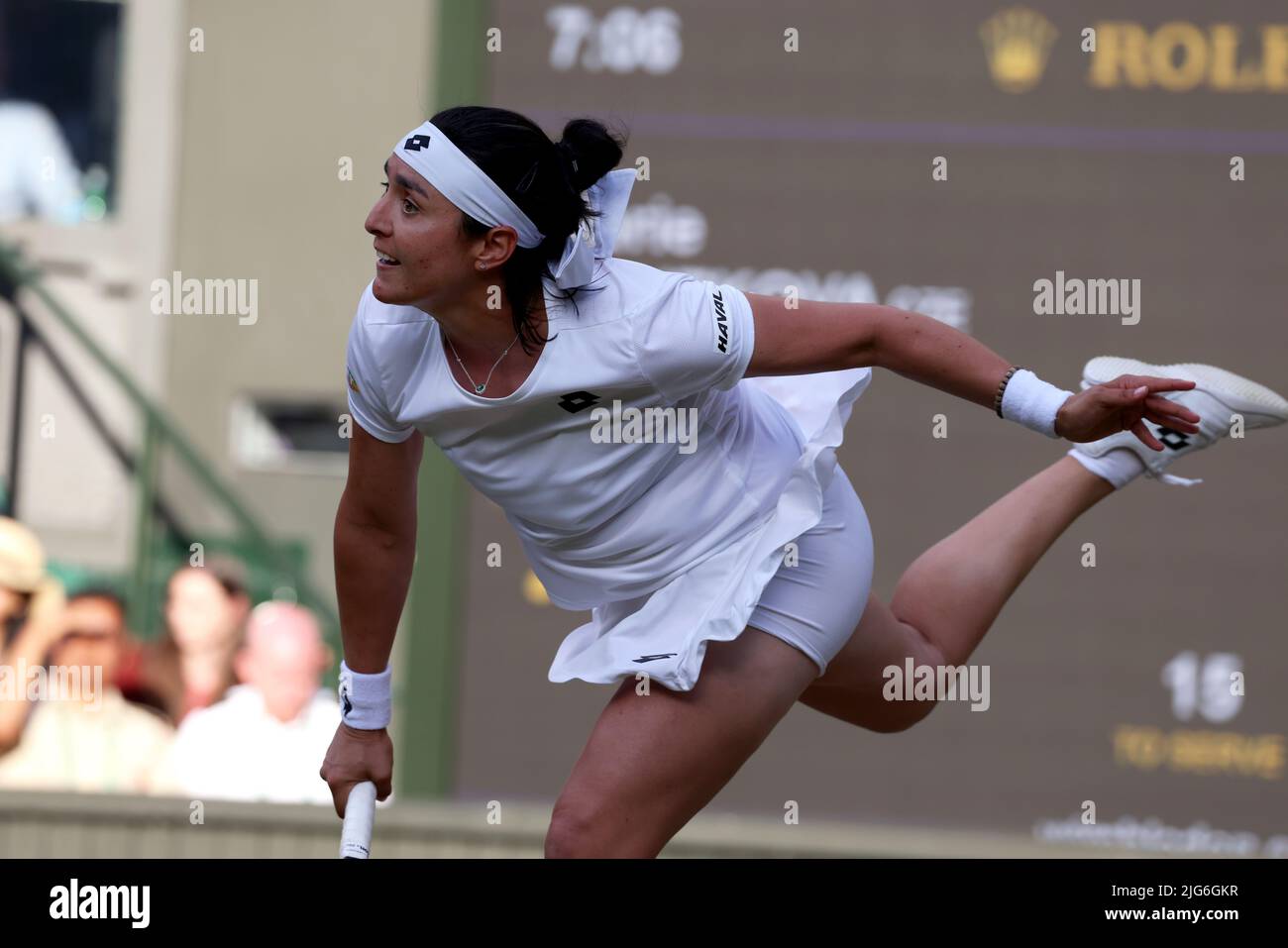 5 July 2022, All England Lawn Tennis Club, Wimbledon, London, United Kingdom:  Tunisia's Ons Jabeur serving during her quarterfinal match against Marie Bouzkova of the Czech Republic at Wimbledon today.  Jabeur won the match to advance to the semi finals. Stock Photo