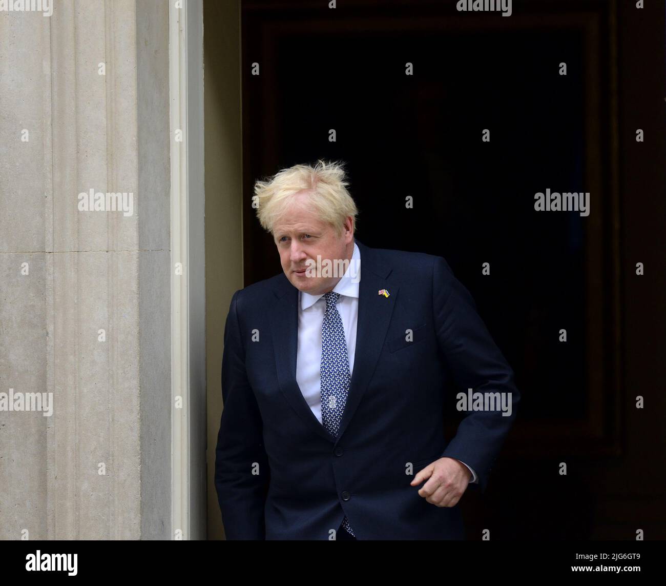 British Prime Minister Boris Johnson exiting No 10 before delivering his resignation speech in Downing Street, 7th July 2022. Stock Photo