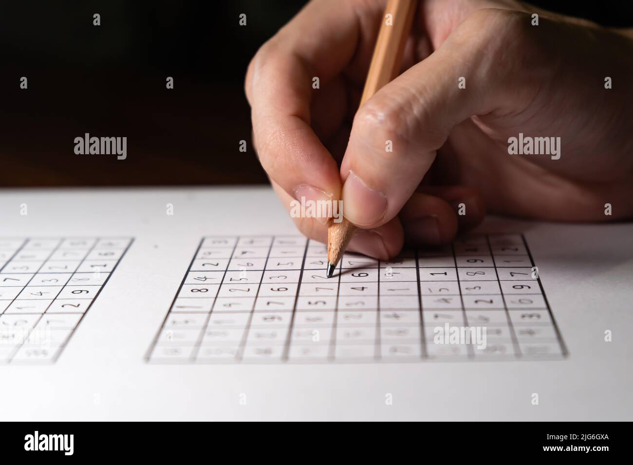 Solving sudoku puzzle with pencil stock photo alamy