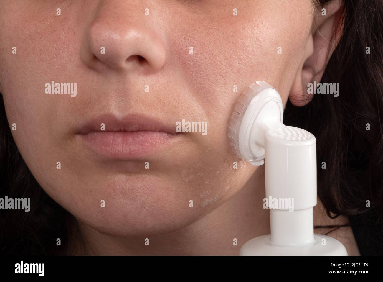 face cleaning with foam, cosmetic skin care. Stock Photo