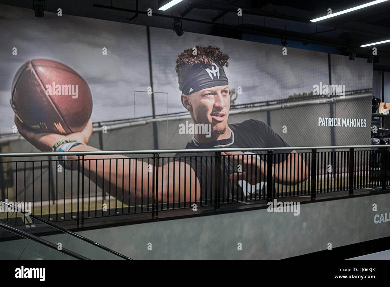 A gigantic horizontal photo of quarterback Patrick Mahomes on the second floor of the adidas store on Broadway in Greenwich Village. Stock Photo