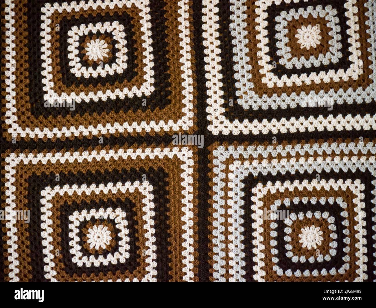 Knitted handmade blanket. Stock Photo