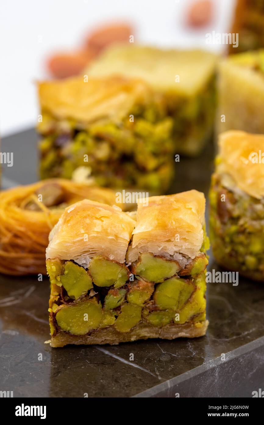 Varieties of pistachio baklava. Variety of baklava isolated on white ...