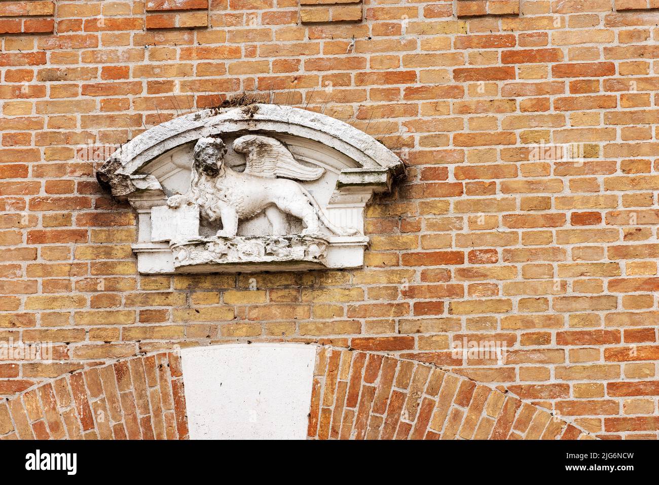 Winged Lion of Saint Mark (Leone di San Marco or Leone Marciano) symbol of the Venetian Republic and the Mark the Evangelist. Oderzo, Treviso province. Stock Photo