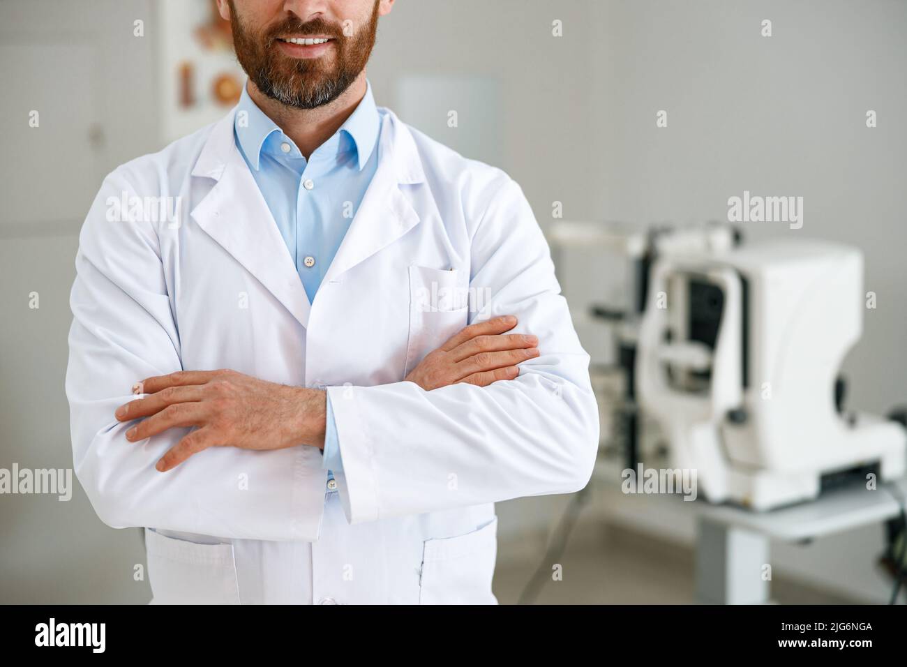 Close up of ophthalmologist on the background of professional