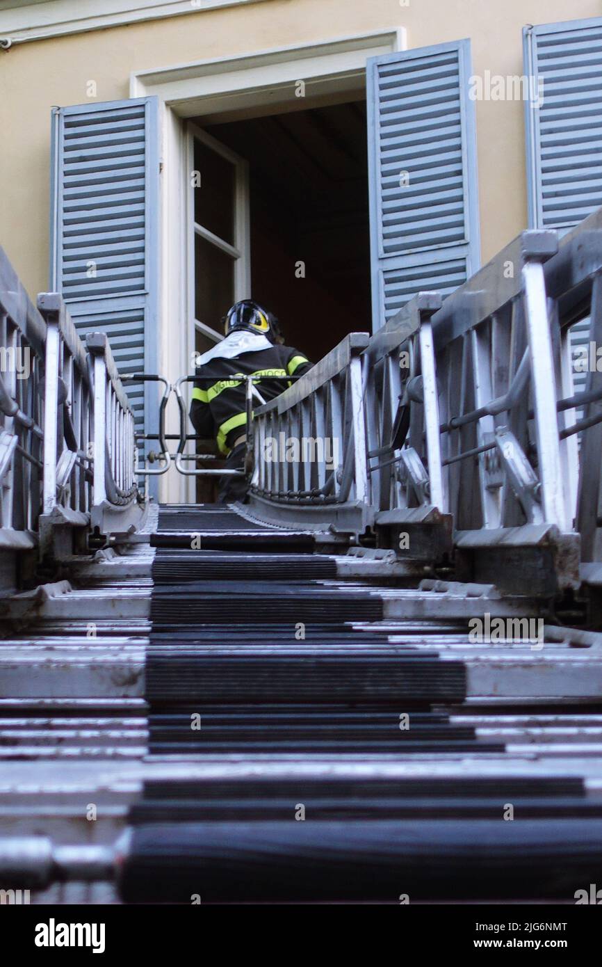 The firefighters' extendable ladder called a ladder truck in extension