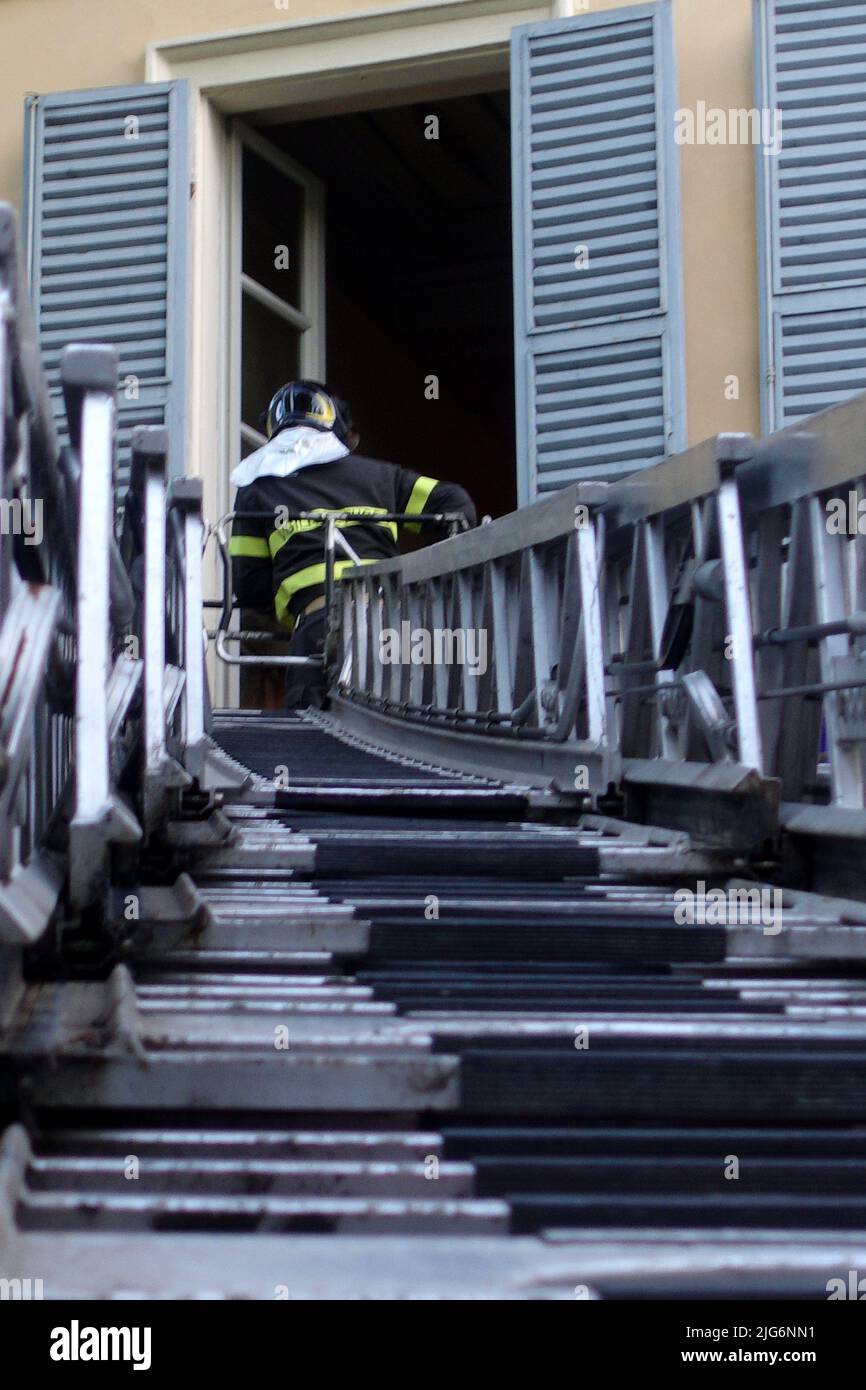 The firefighters' extendable ladder called a ladder truck in extension
