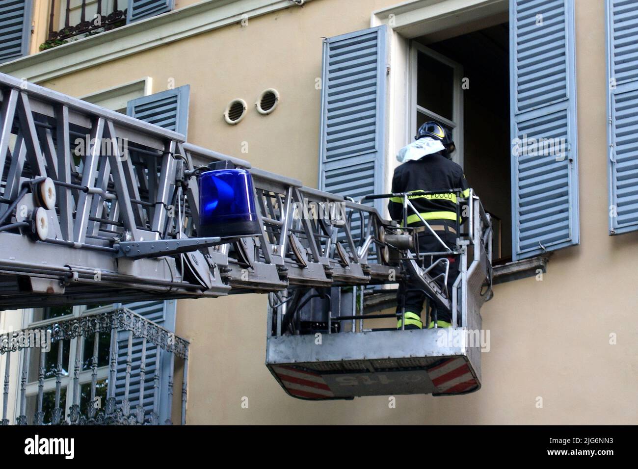 The firefighters' extendable ladder called a ladder truck in extension