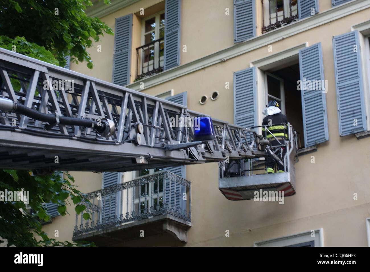 The firefighters' extendable ladder called a ladder truck in extension