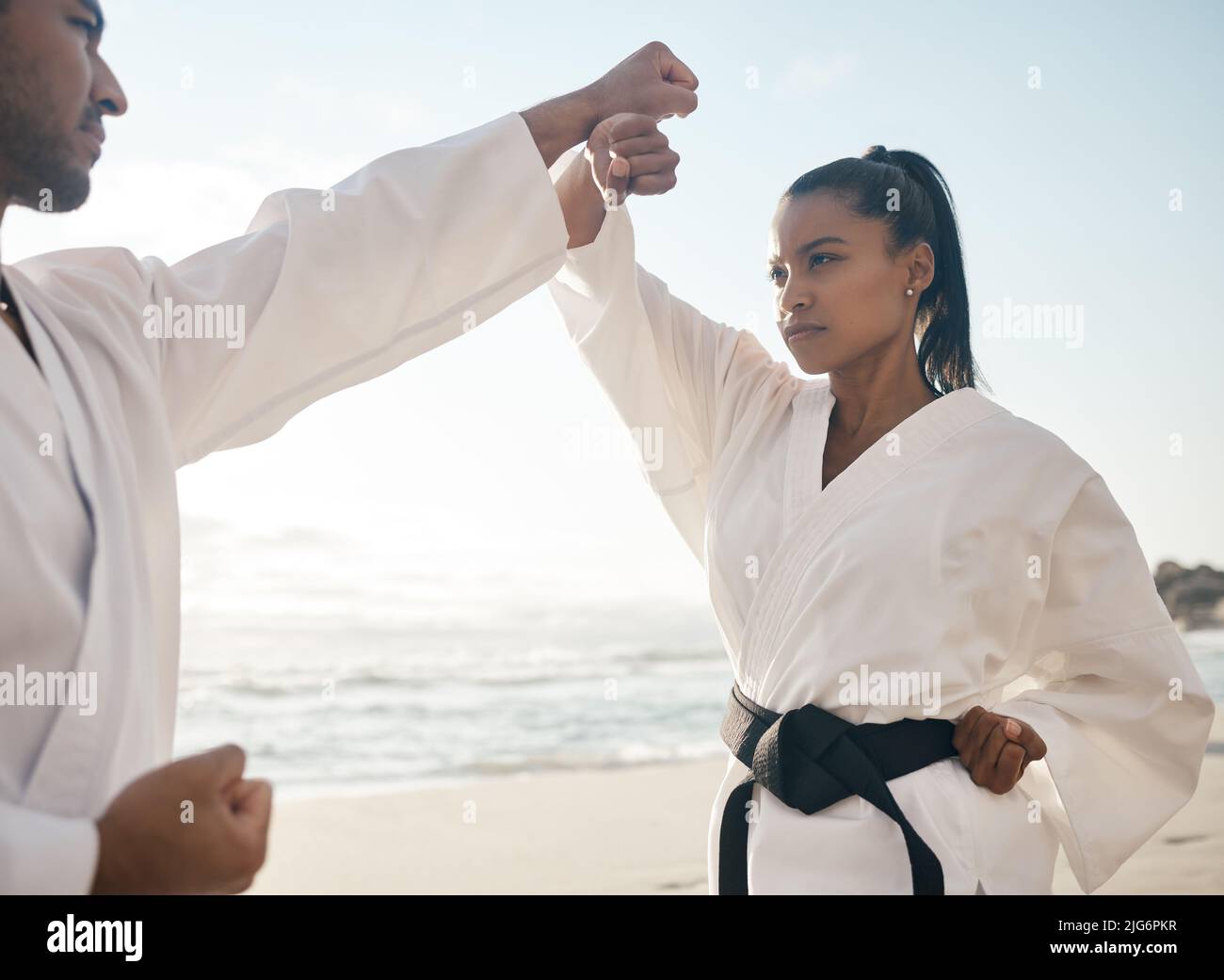 Going through their routines. Cropped shot of two young martial artists