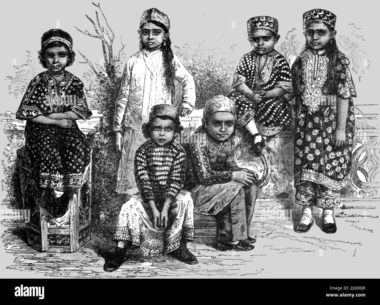 'Parsee Children, Bombay; Notes on Bombay and the Malabar Coast', 1875. [Parsi children from what is now Mumbai, India]. From, 'Illustrated Travels' by H.W. Bates. [Cassell, Petter, and Galpin, c1880, London] Belle Sauvage Works.London E.C. Stock Photo