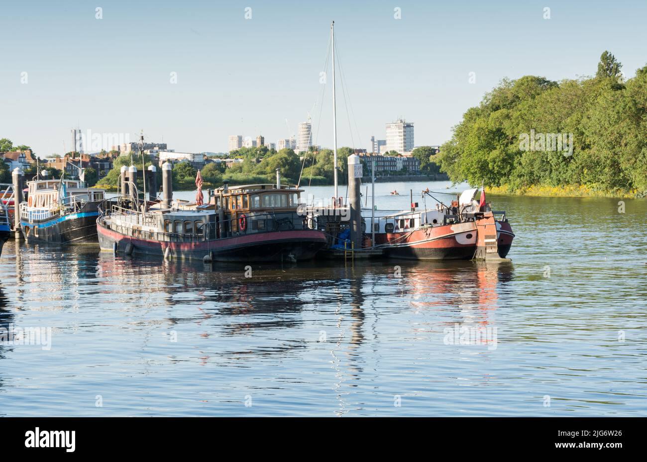 Houseboats moored at Chiswick Pier, Chiswick, London, England, UK Stock Photo