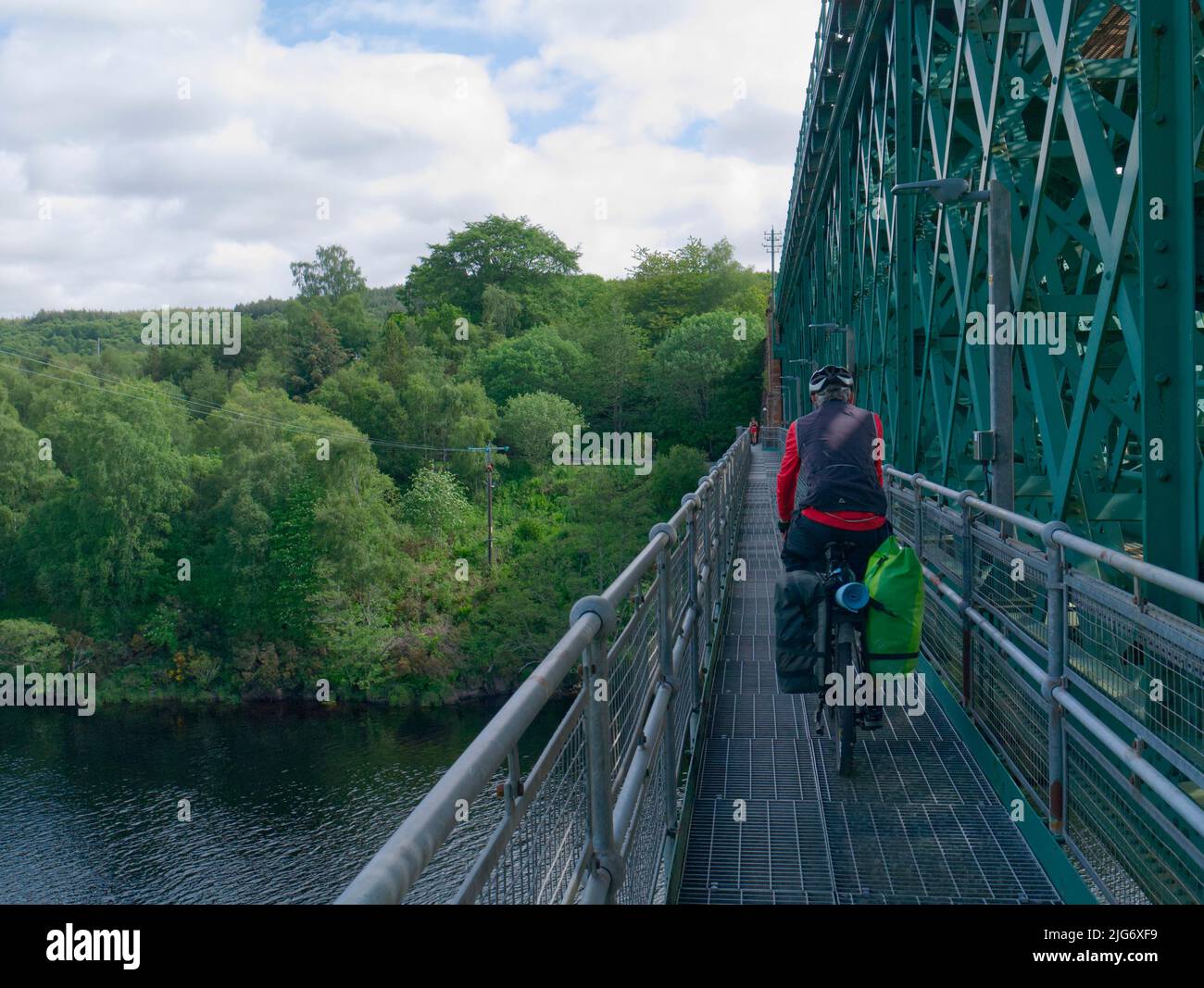 Cycling across Carbisdale viaduct, Highland Scotland Stock Photo