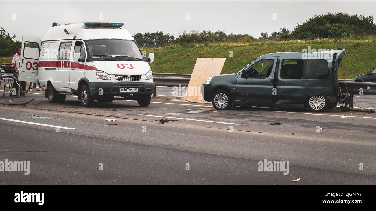 Russian Emergency 03 team working in highway on car accident Stock Photo