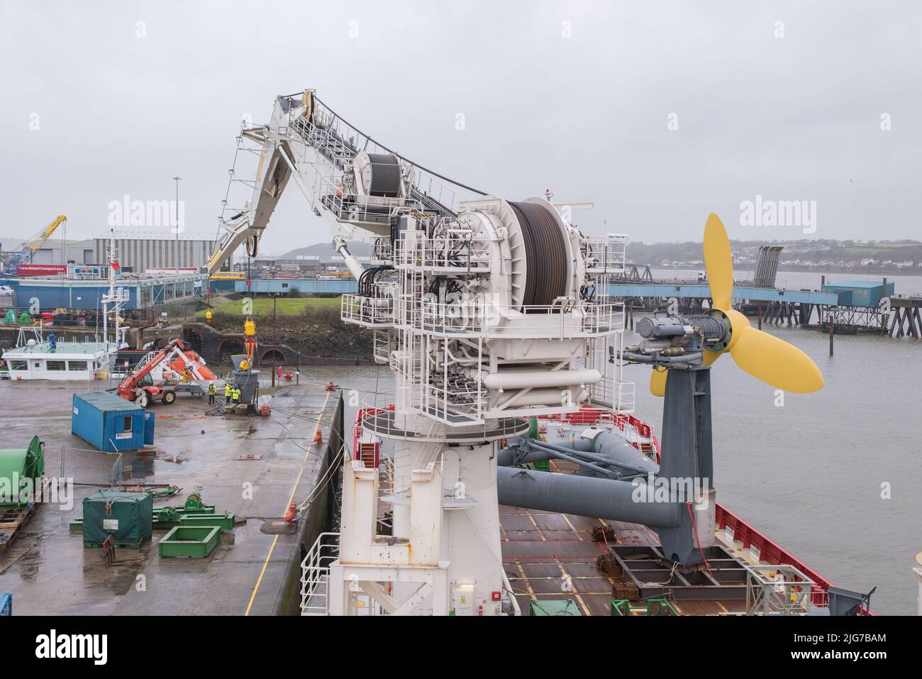 Loading ballast pods onto deployment vessel for DeltaStream tidal energy device, Pembroke Dock Stock Photo