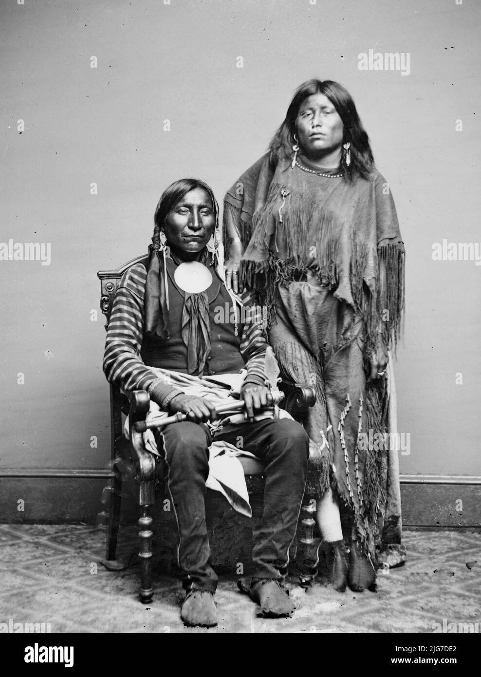 Lone Wolf and his wife Etla, Kiowa Indians, between 1855 and 1865. Stock Photo