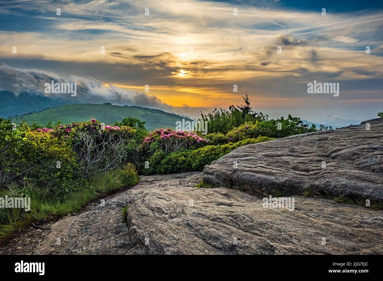 The sun sets above the Roan Mountain Highland in Tennessee Stock Photo