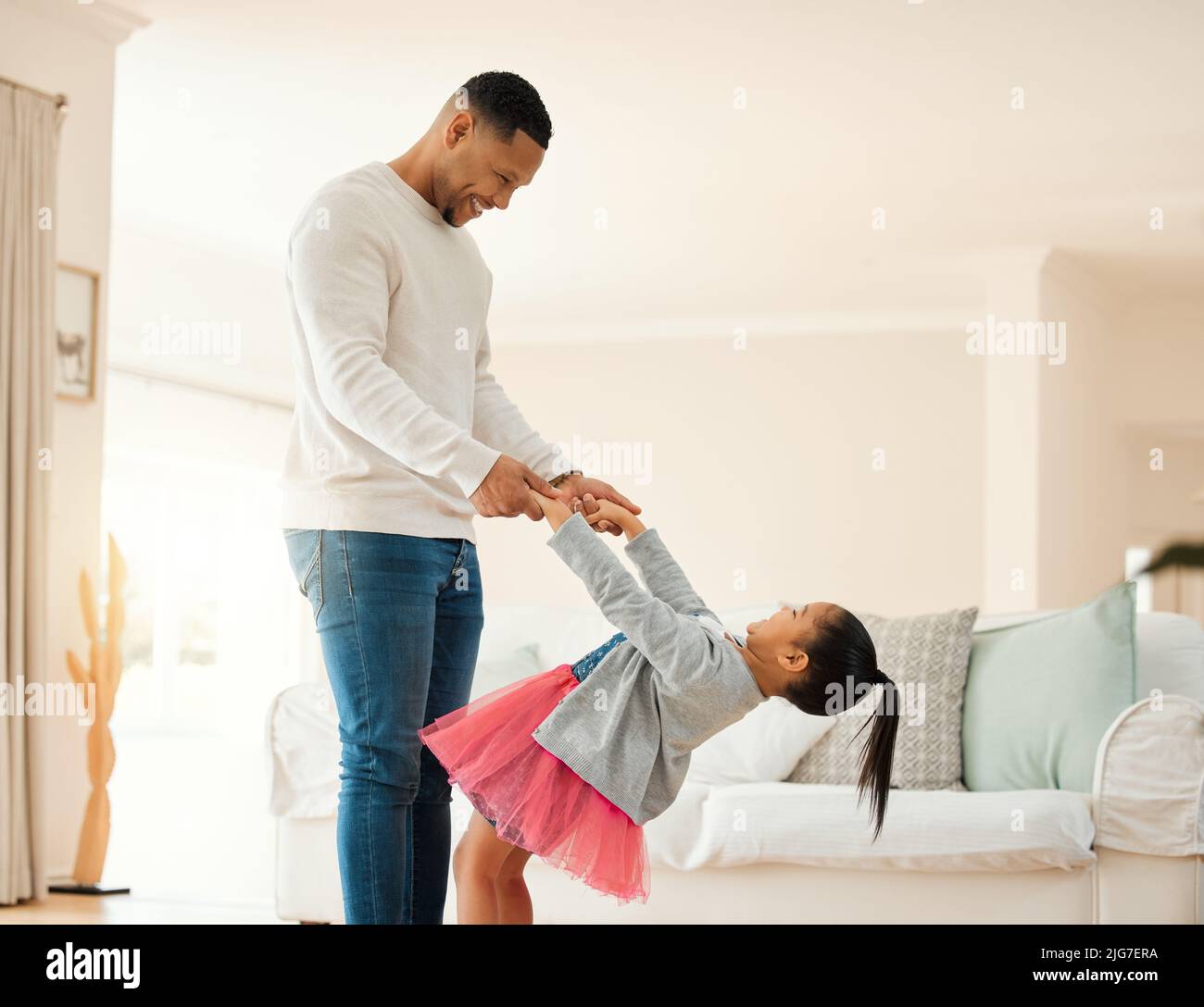 Shell always be dads little girl. Shot of a little girl playing with ...