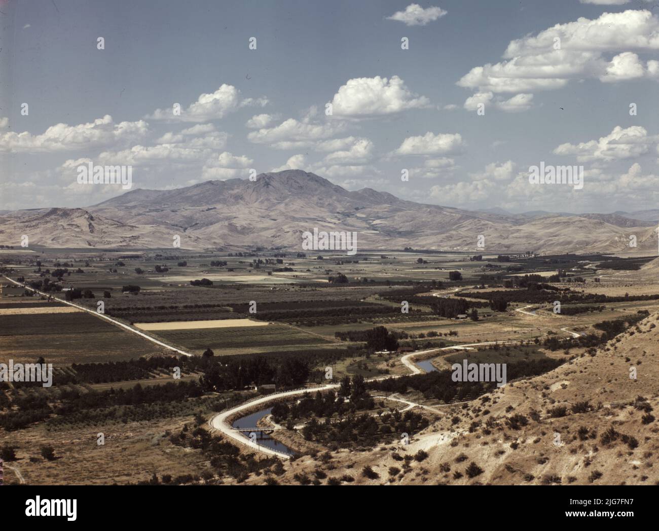 Cherry orchards, farm lands and irrigation ditch at Emmett, Idaho Stock