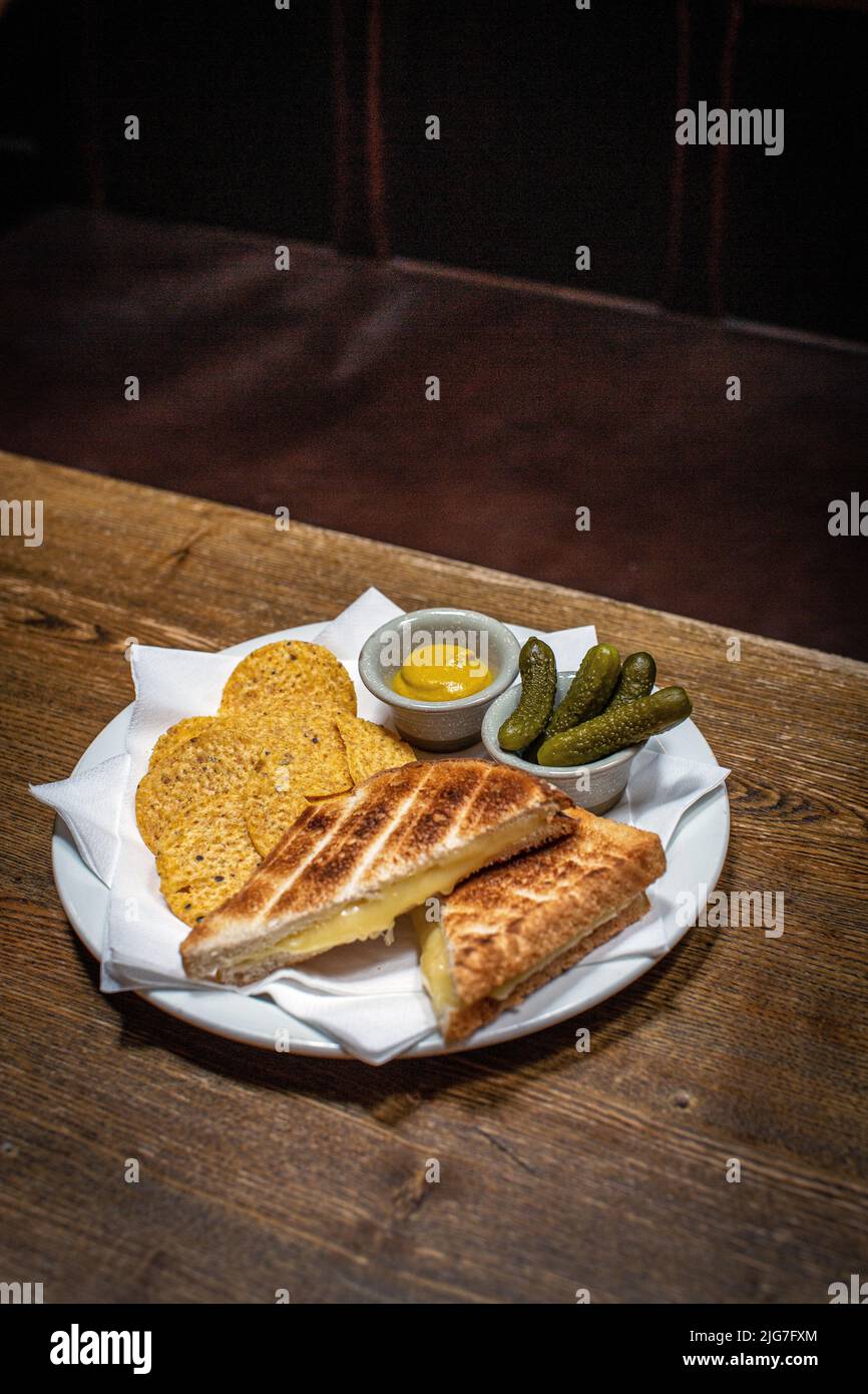 Cheese and pickle toastie at Ye Olde Mitre Public House, London, UK Stock Photo