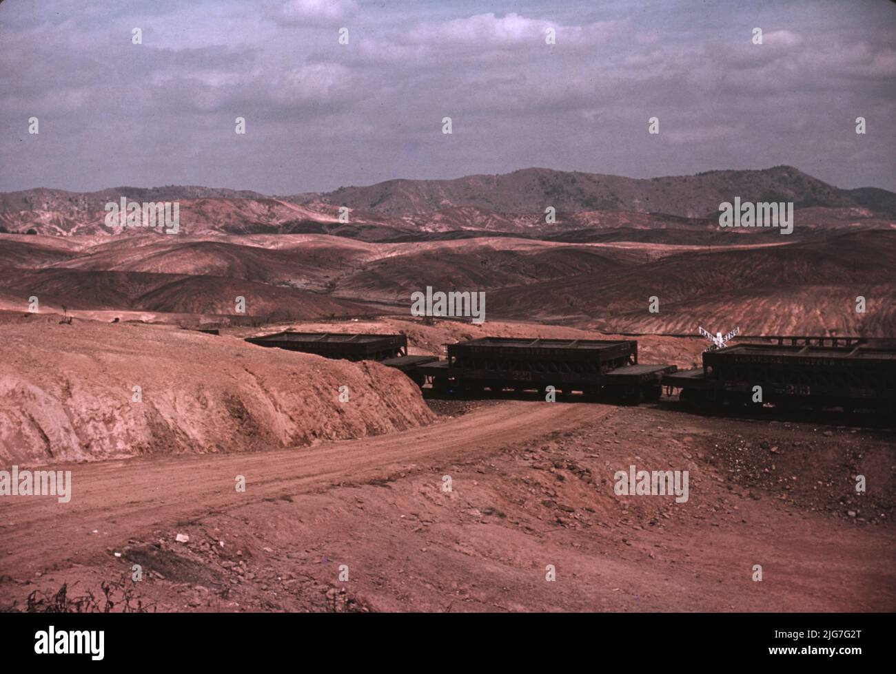 A train bringing copper ore out of the mine, Ducktown, Tennessee. Fumes
