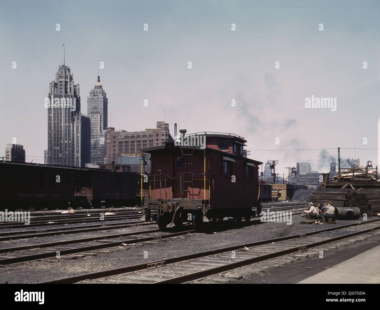 General view of part of the south Water street freight depot of the Illinois Central Railroad, Chicago, Ill. A C and O R.R. [Chesapeake and Ohio Railway] caboose. the C and O is one of the railroads that lease terminal facilities from the I.C.R.R [Illinois Central Railroad]. Stock Photo