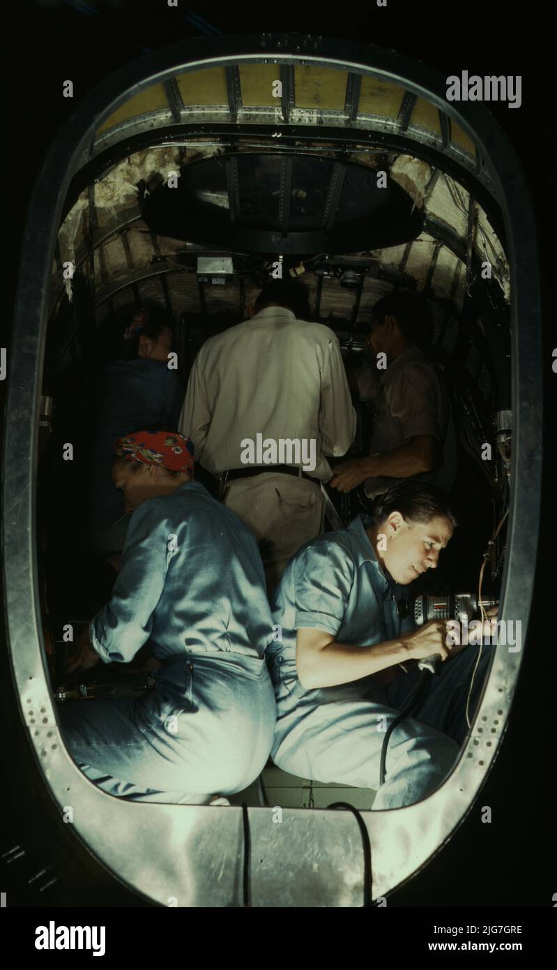 Inside Fuselage Working inside fuselage of a Liberator Bomber, Consolidated Aircraft ...